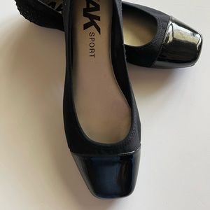 New AK Sport flats in black with patent detail. Size 9M